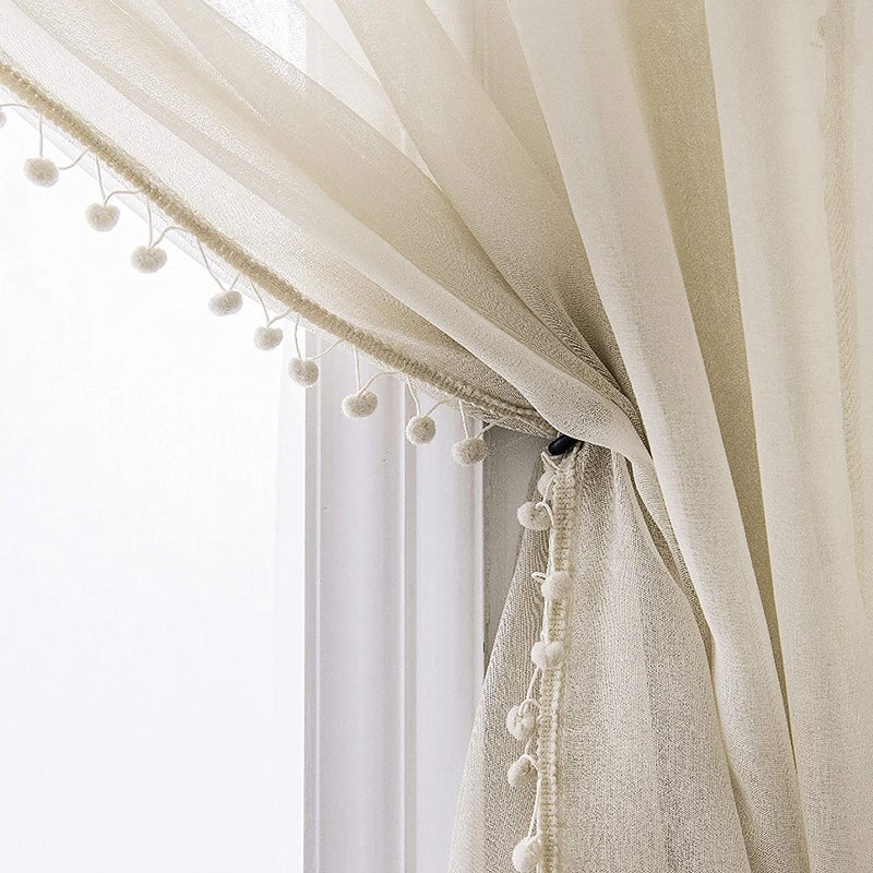 MISS SELECTEX Linen Look Pom Pom Tasseled Sheer Curtains - Rod Pocket Voile Semi-Sheer Curtains for Living and Bedroom, Set of 2 Curtain Panels (52 x 84 inch, Nature) - Image 1